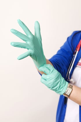 16362-a-healthcare-provider-donning-a-pair-of-latex-gloves-pv.jpg