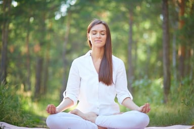 concentrated-woman-meditating-in-nature_1098-1412.jpg