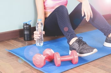 fitness-woman-holding-bottle-of-water-after-workout-healthy-lifestyle-concept_1428-72.jpg