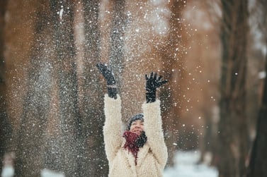 happy-girl-throwing-snow_1153-1431.jpg