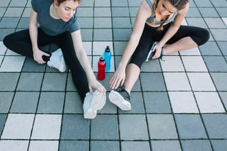 women-stretching-arms-to-feet_23-2147752599.jpg